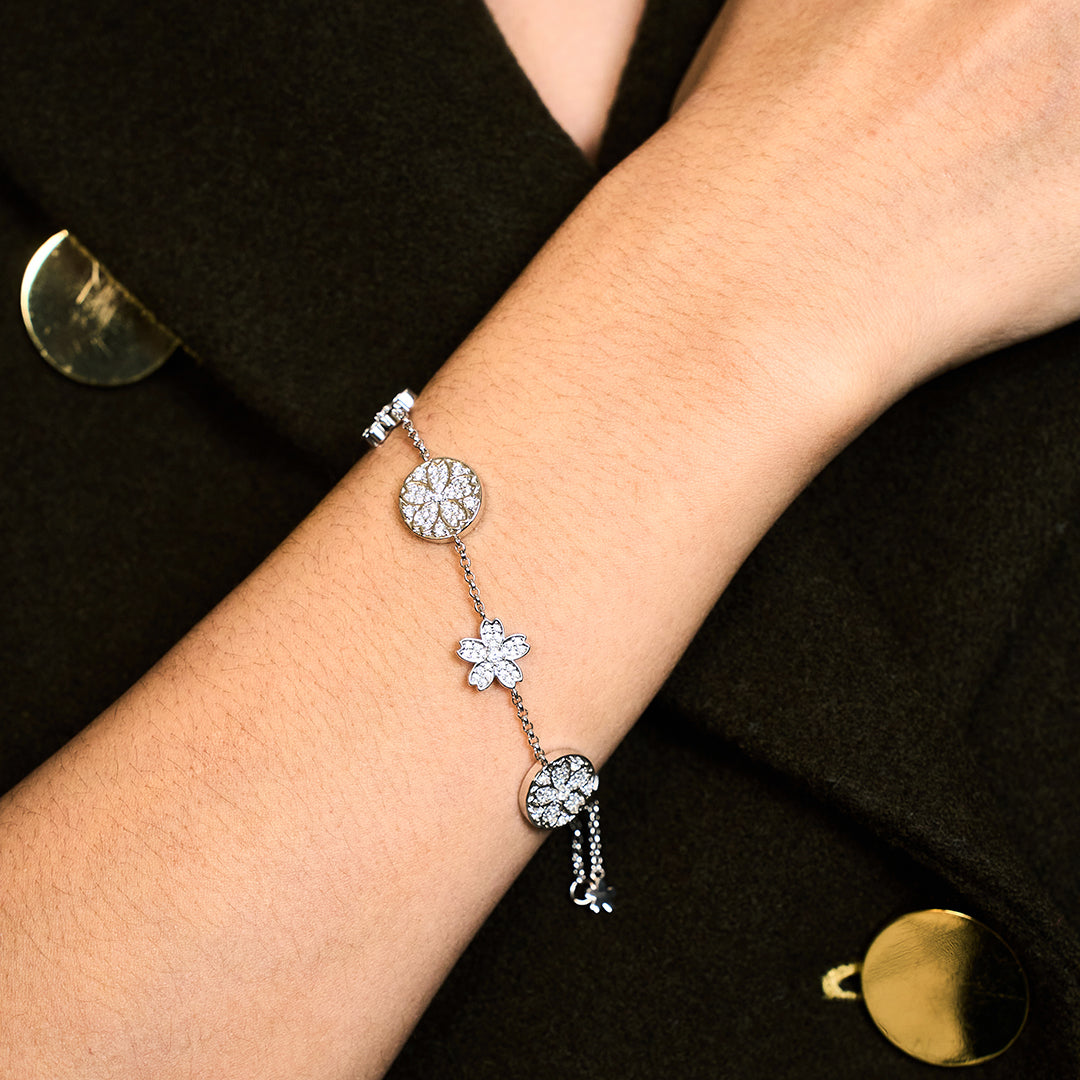 Cherry Blossom Symphony Pavé 7-Flower Zirconia Silver Station Bracelet (Platinum Plated) - BLACK BY BLUE BRAVE